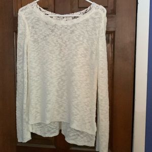 Small sweater with lace accent on the back